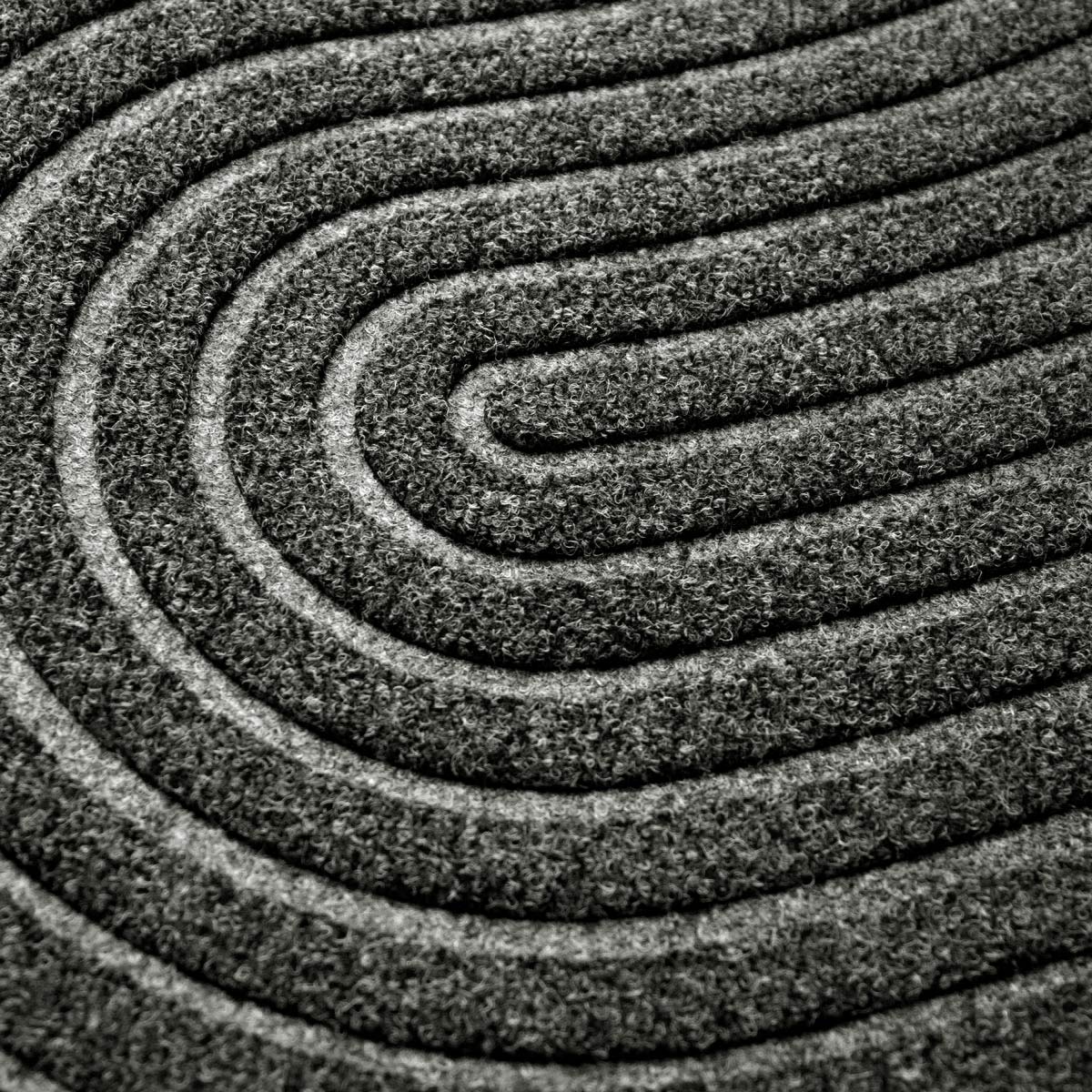 Close-up of black mat with circular pattern