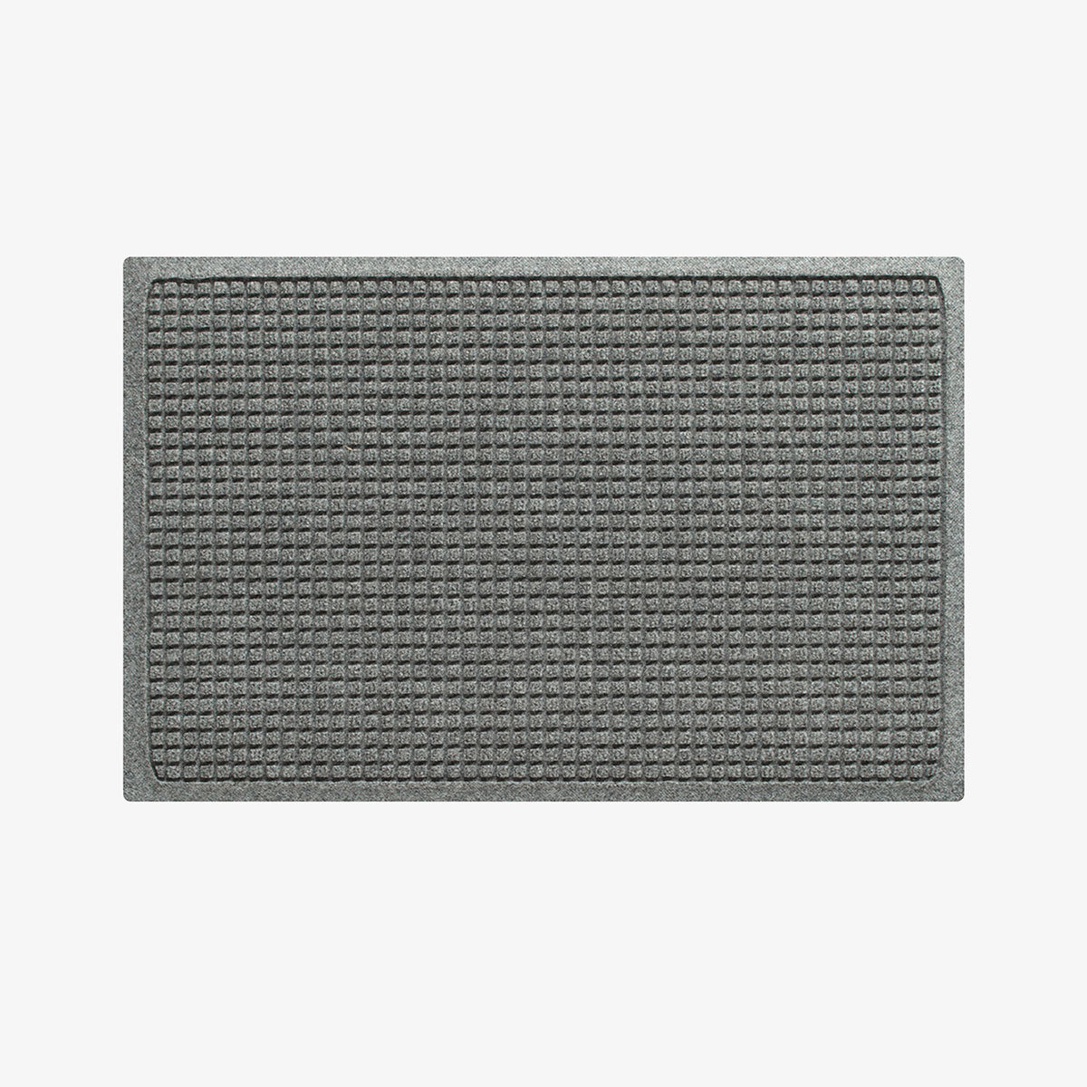 Gray doormat with textured surface on a white background
