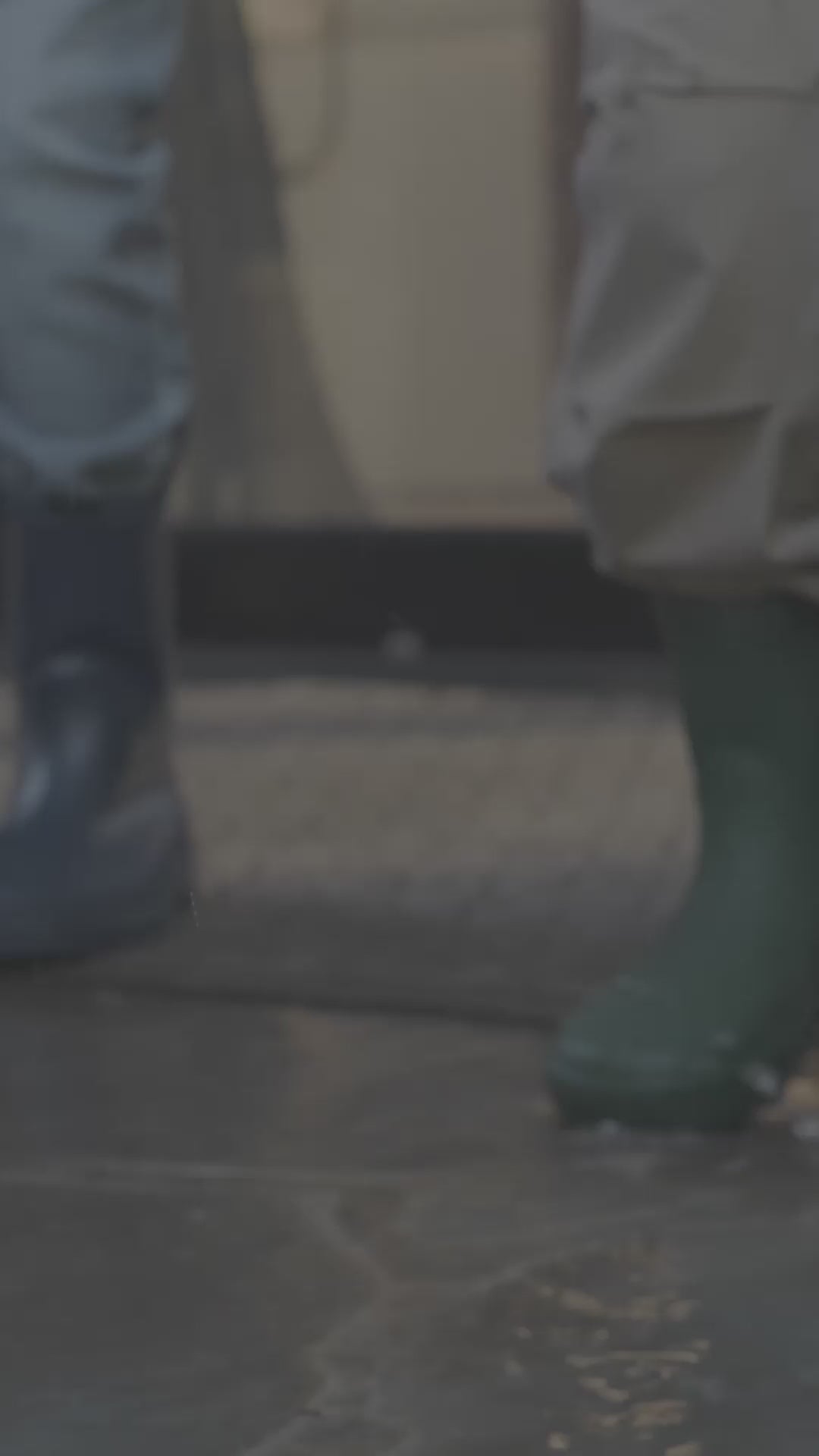 kids springing in water puddles